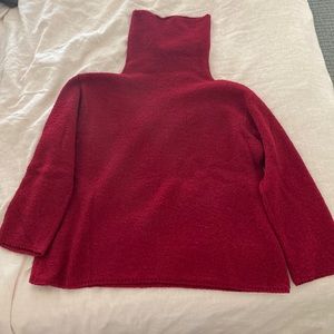 Red boucle turtleneck sweater